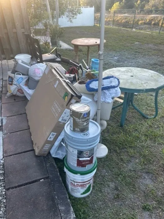 Backyard patio cleanout before hurricane season in Miami
