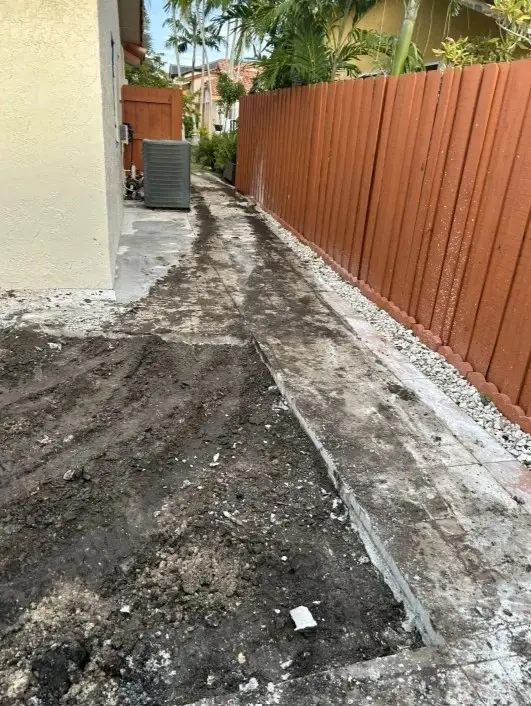 Cleared side yard after same-day junk removal in Miami
