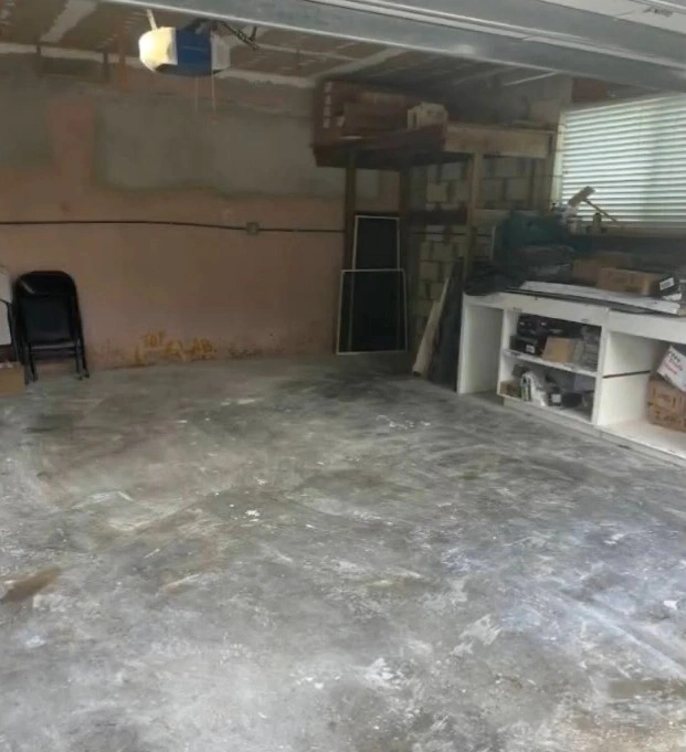 Empty clean garage floor after junk removal cleanout in Miami